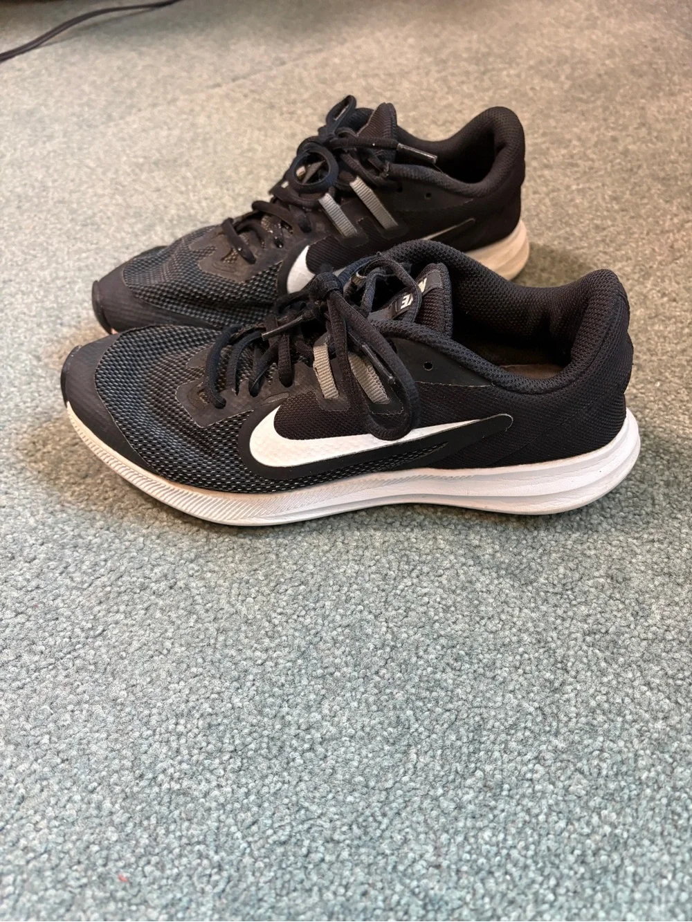 Nike Black Mesh Athletic Sneakers with White Swoosh